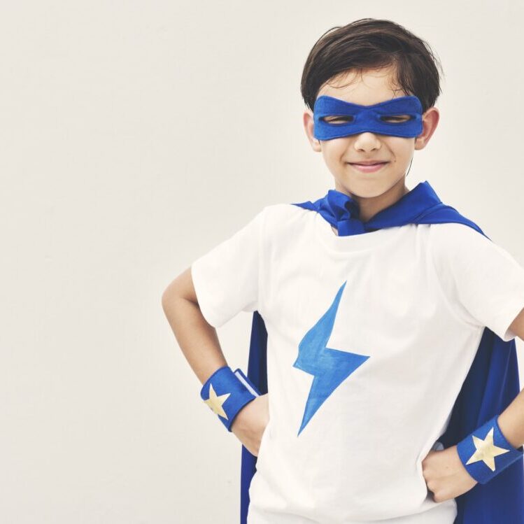 superhero-boy-imagination-freedom-happiness-PSF4H75